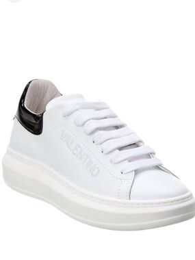 Valentino White Leather Low-Top Sneakers with Black Patent Heel
Women’s 6.5
